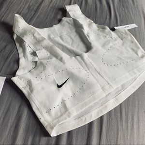 Nike women’s tech pack training crop top.